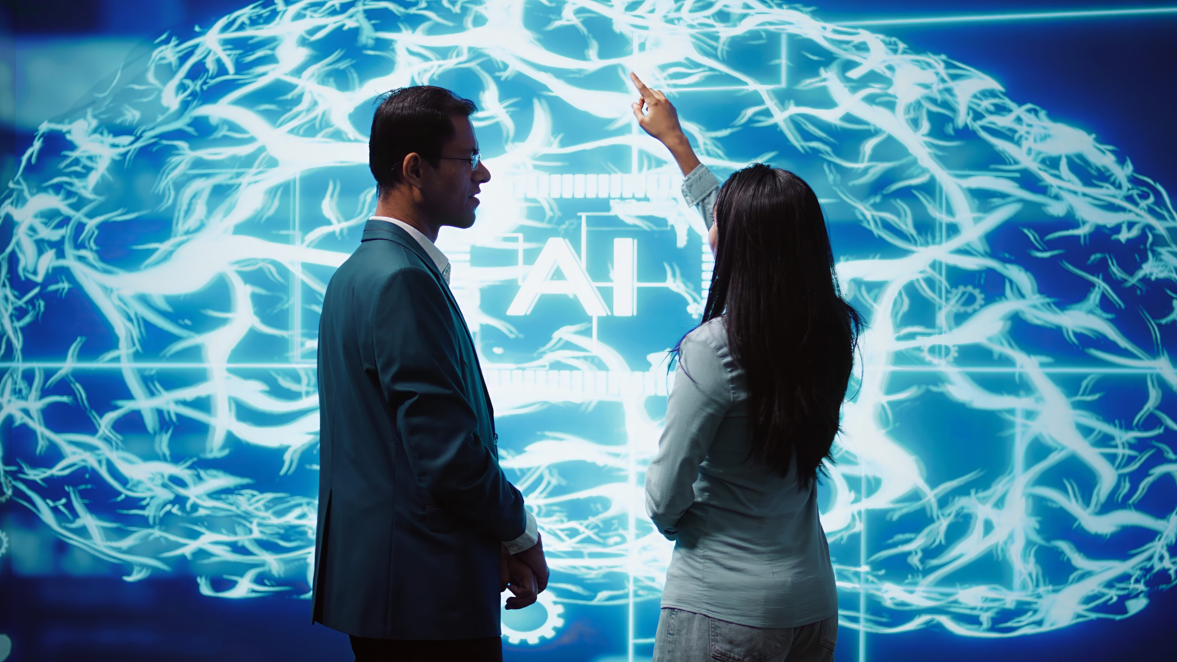 Two people discussing AI brain illustration.