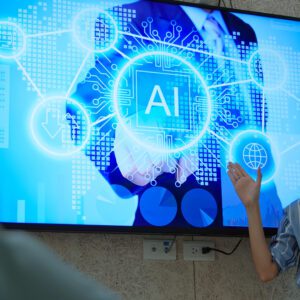Person presenting AI technology on screen.